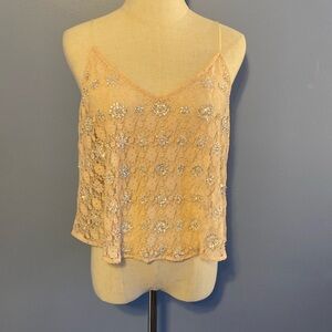 Light pink lace and sequin strappy top. Perfect for nights out or sunny days!